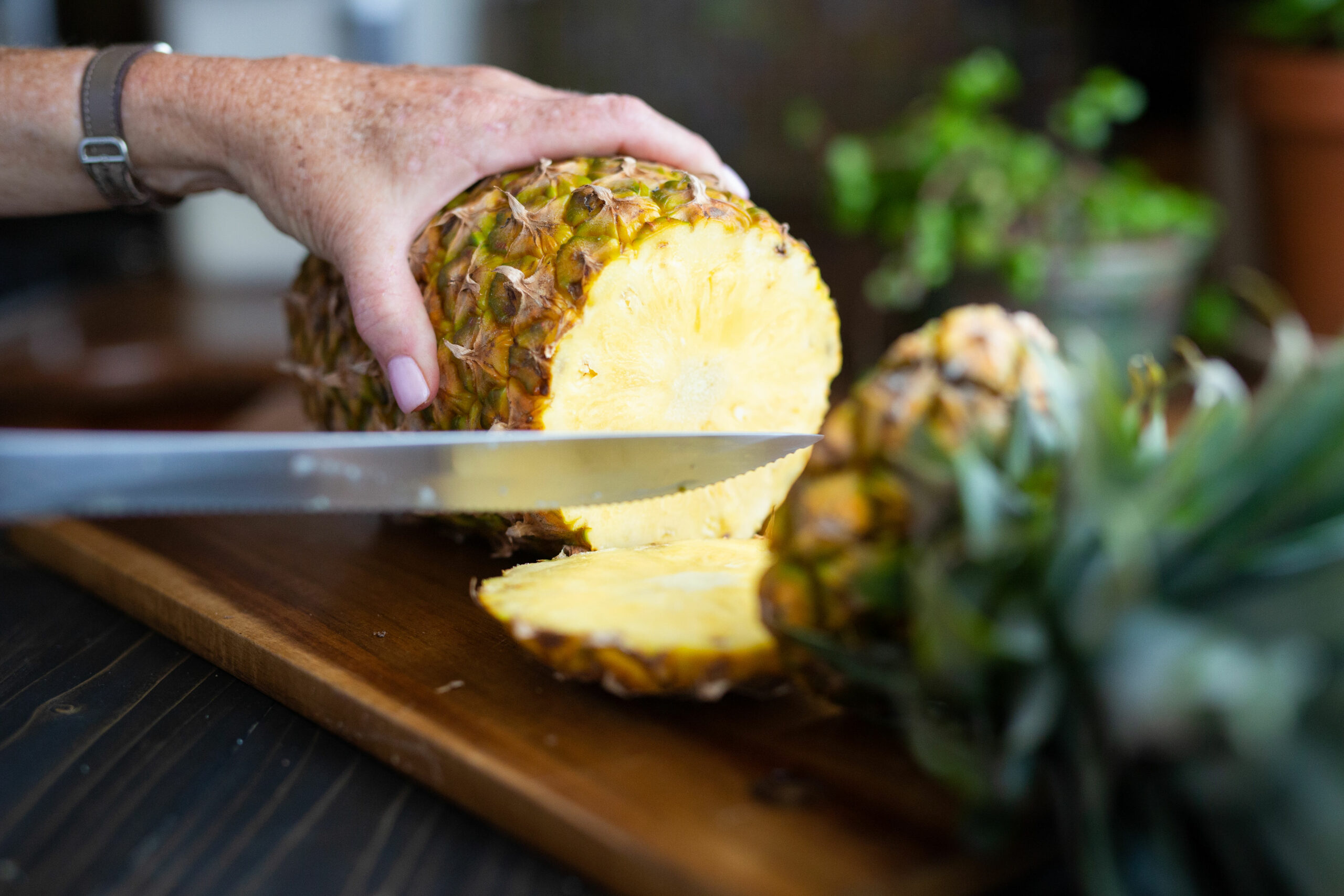 Cutting a pineapple